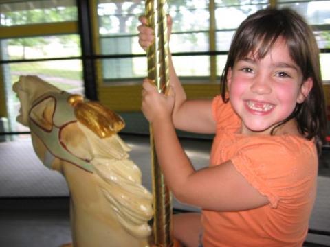 Girl on Carousel